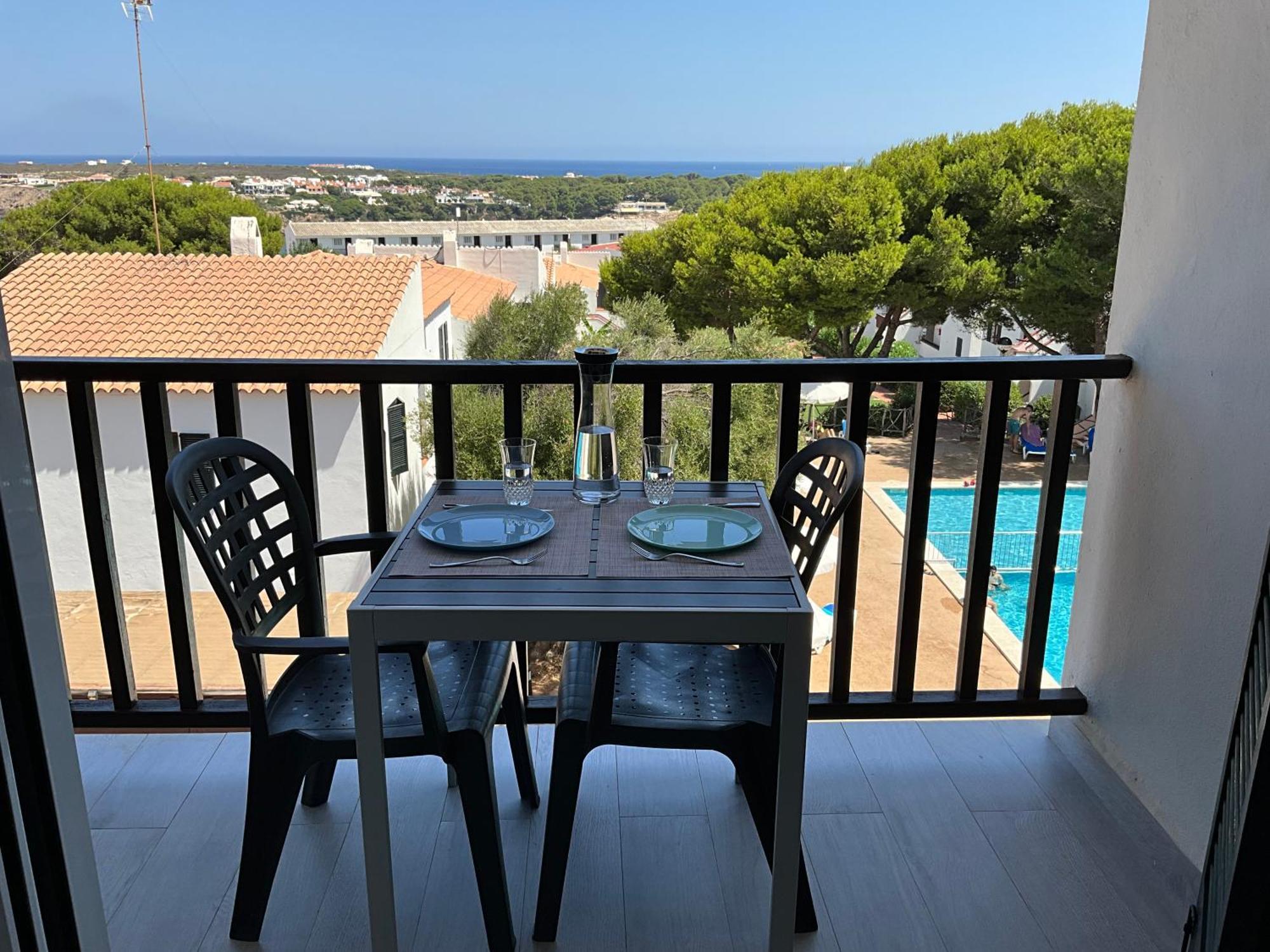 Vistas Al Mar Y La Piscina Apartment Arenal d'en Castell Bagian luar foto